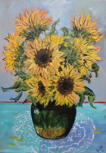 Sunflowers in a green jar